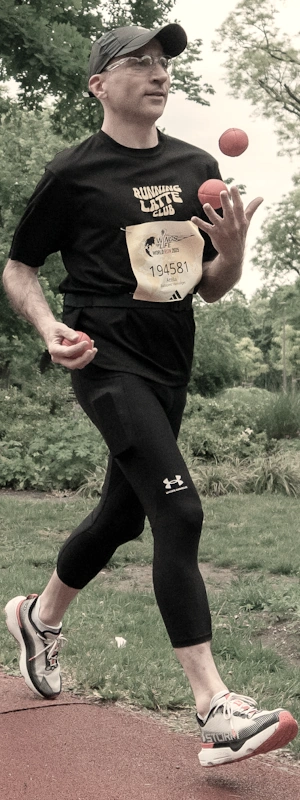 Running while juggling at Wings for Life in 2025.